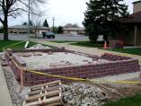 Building the wall - 5/6/04. (Photo Courtesty of Vicki Tortorich)